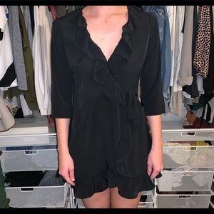 Black ruffled dress from TopShop.